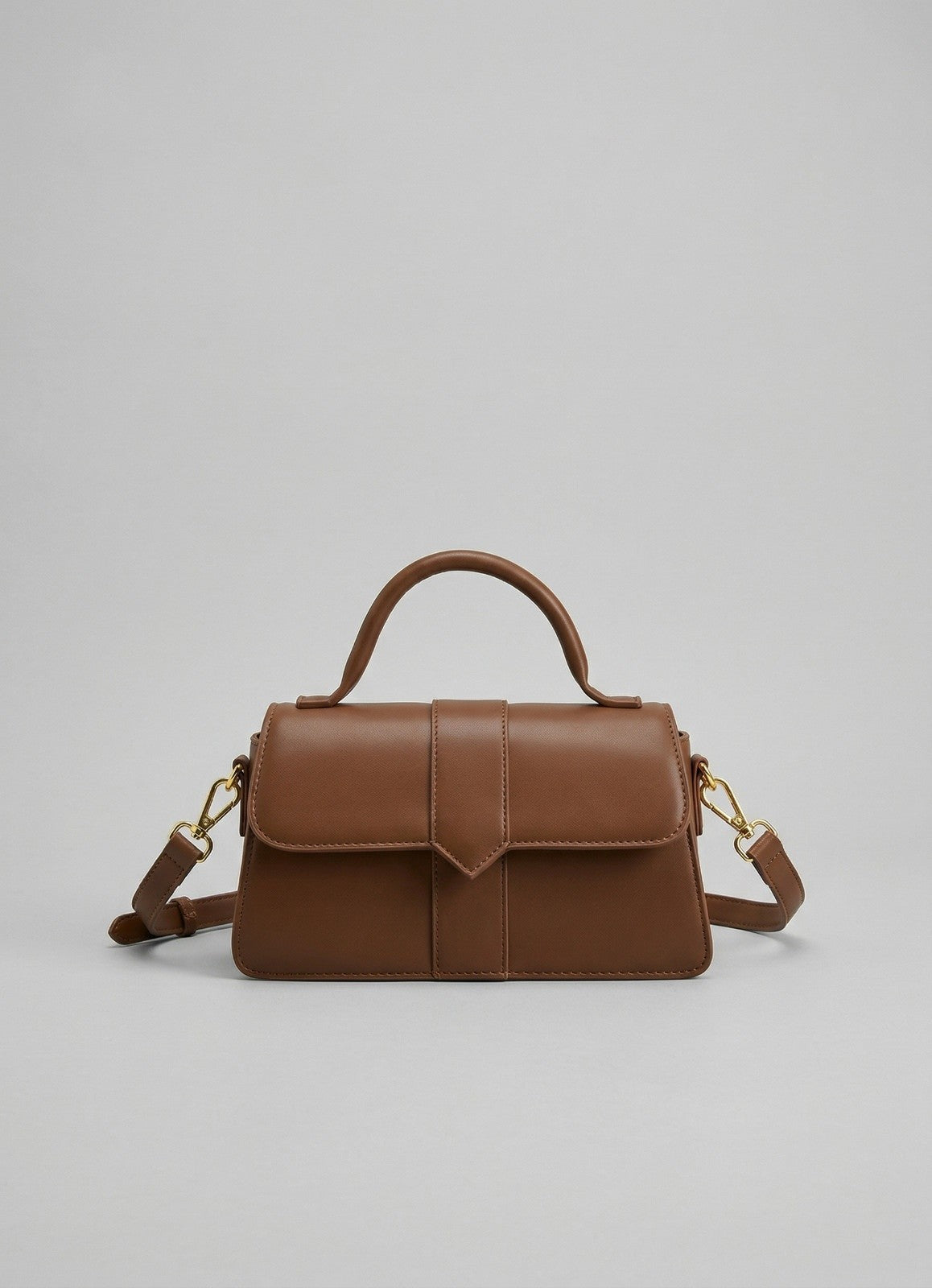 Kompakte Schultertasche mit Metalldetails